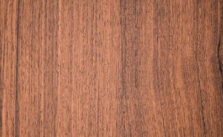 A Caribbean Walnut (Tzalam) wood slab with deep, dark grain.